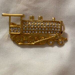 Vintage train brooch with white stones